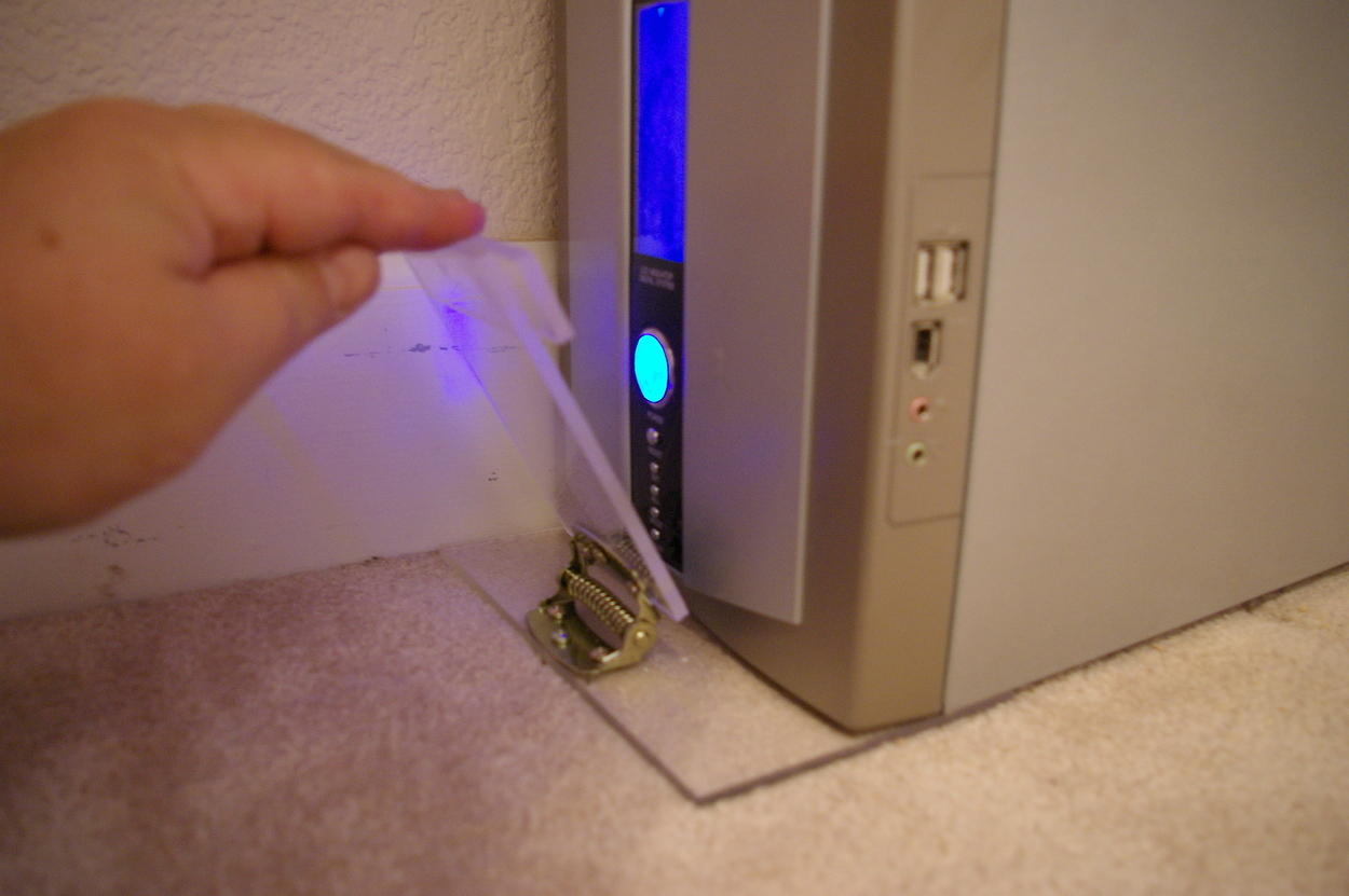 Baby Proofing - Computer power button cover - Held Open